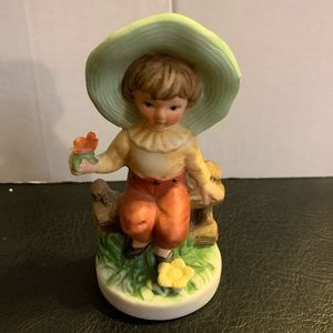 Adorable little boy figurine